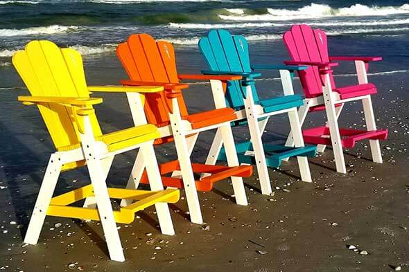 ITOF - Colorful wooden chairs at the beach